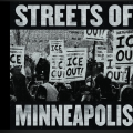 Streets of Minneapolis Sign in front of protesters