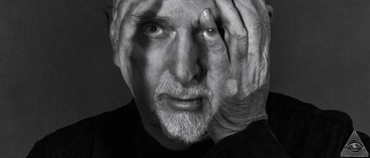 Peter Gabriel close-up with hand on face