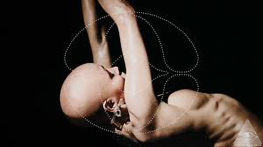 Artist nude dancing from a side view