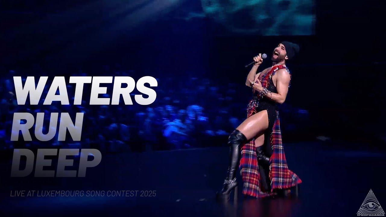 Conchita Wurst performing on stage