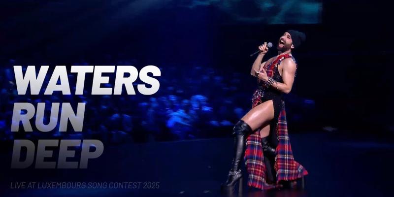 Conchita Wurst performing on stage