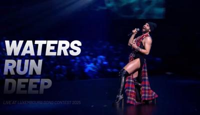 Conchita Wurst performing on stage