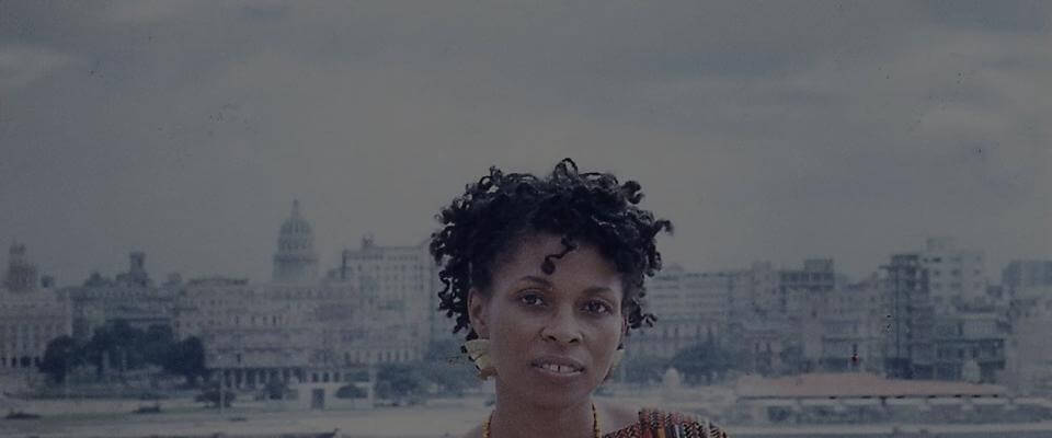 Assata Shakur sitting